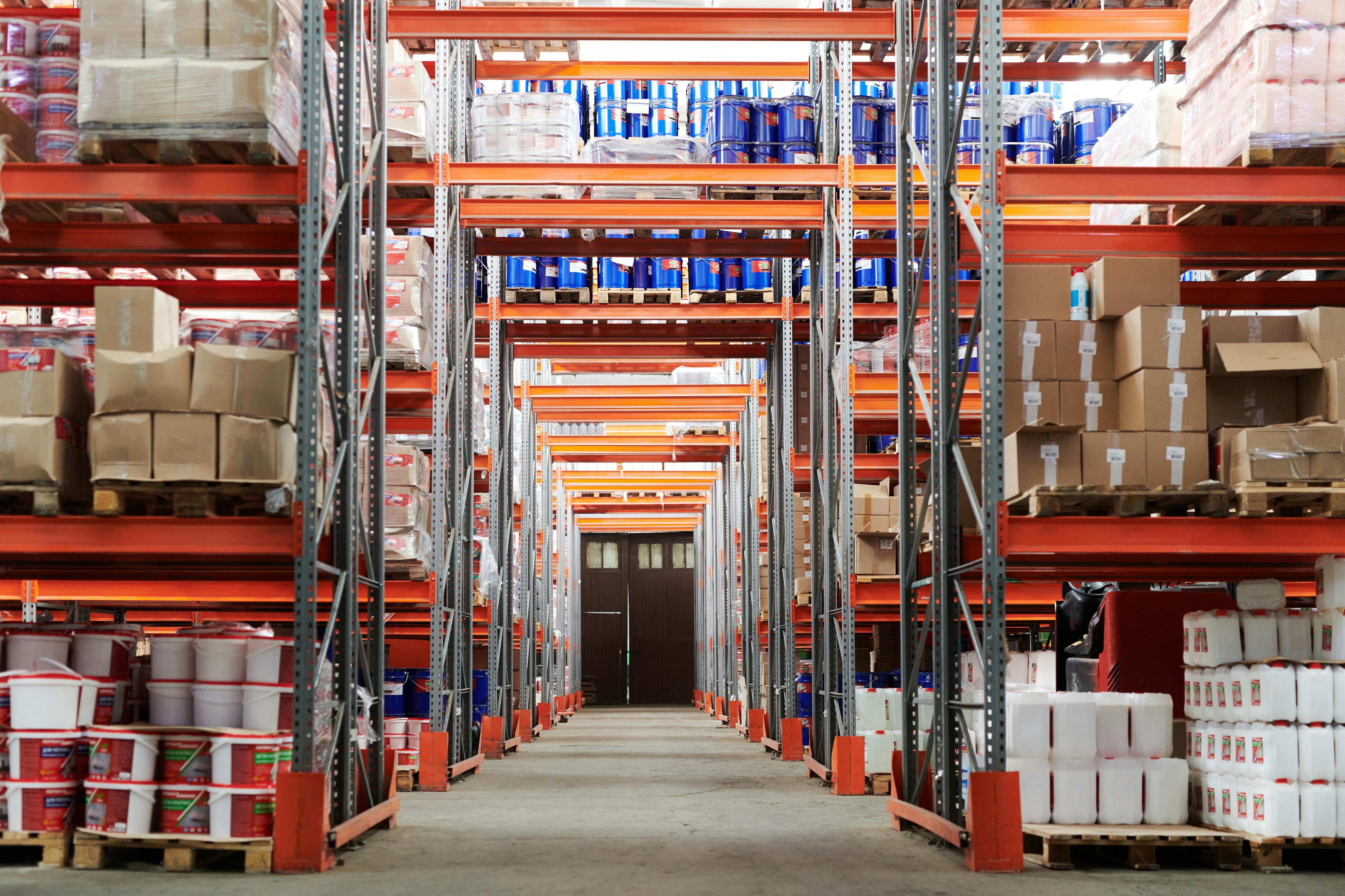 Storage racks filled with boxes in warehouse